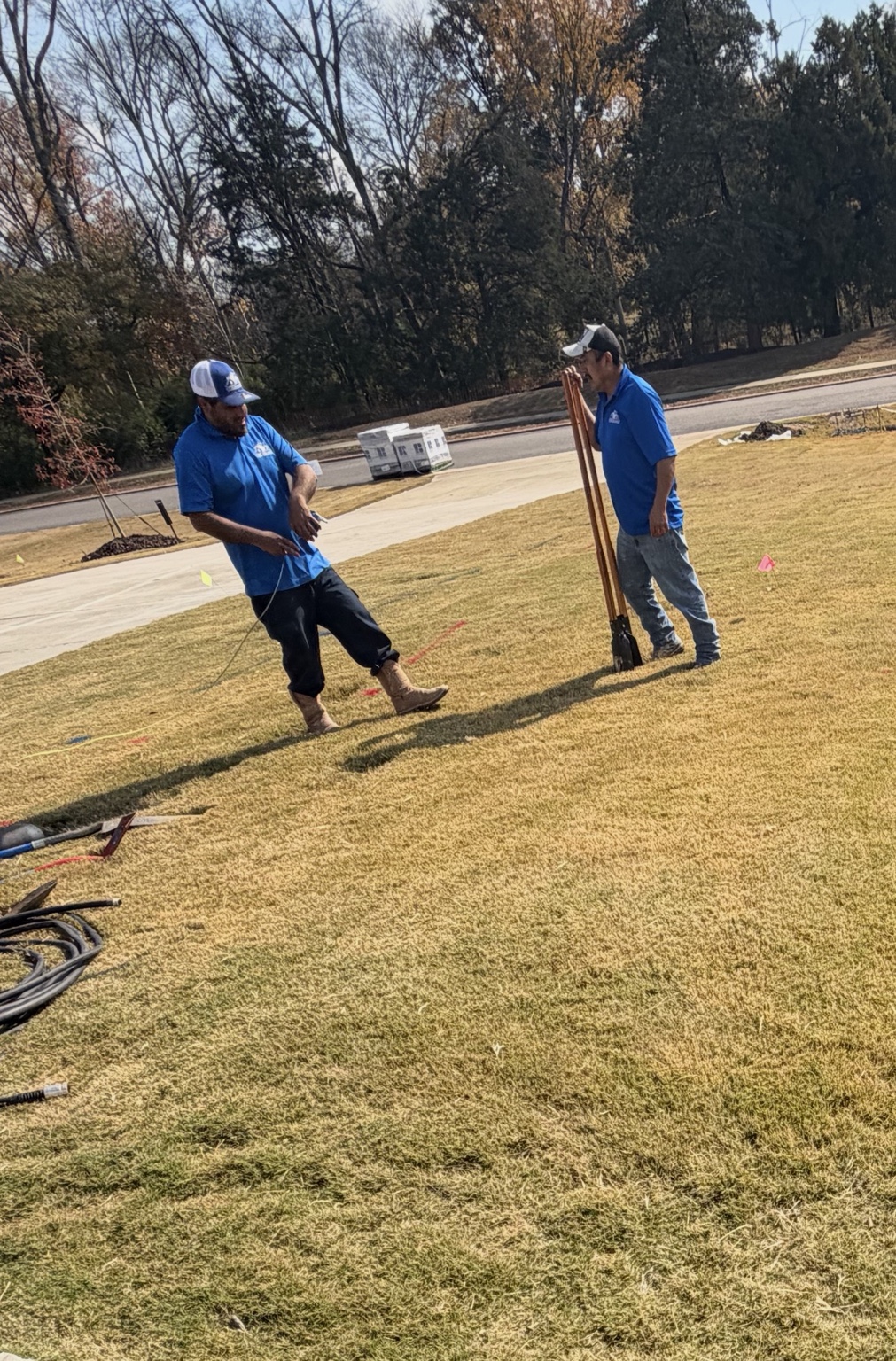AB Home Improvements crew working on an outdoor installation