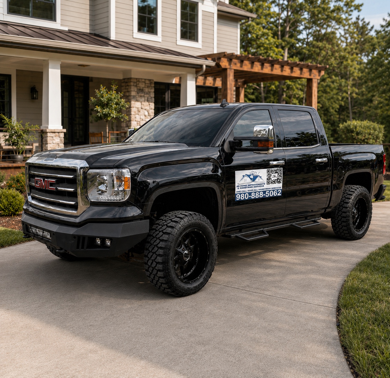 AB Home Improvements branded work truck at a jobsite